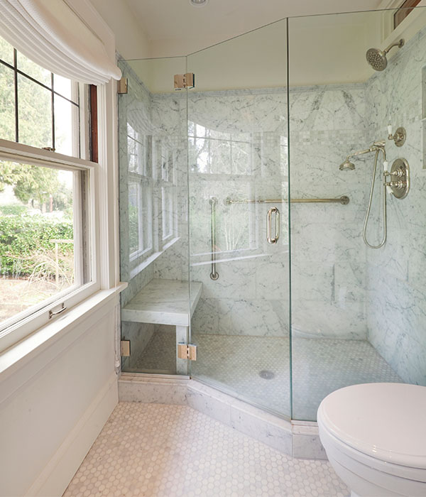 Modern bathroom with framless glass shower