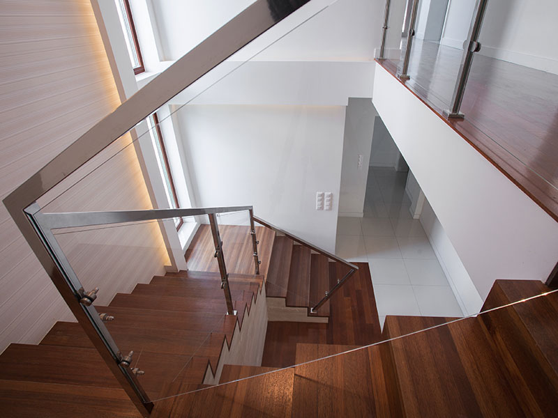 Glass and metal railings in residential home.